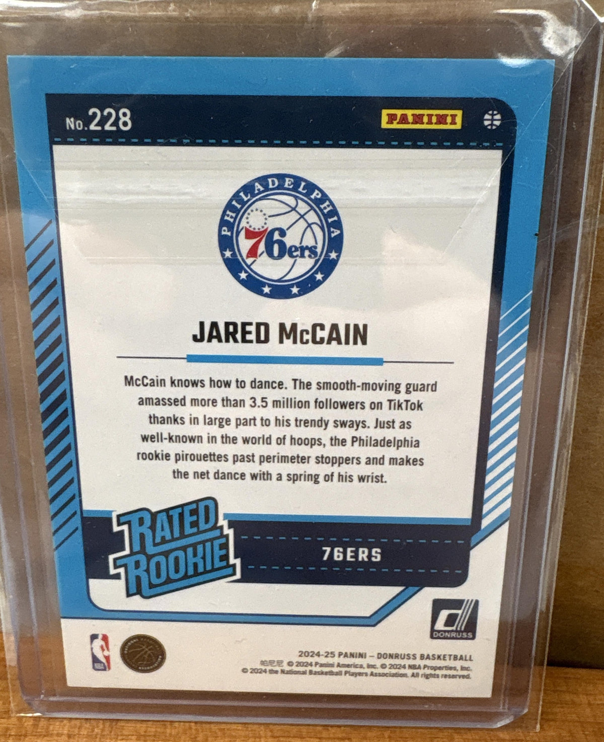 2024-25 Panini Donruss Jared McCain #228 Holo Red Laser 69/99 Rated Rookie 76ers