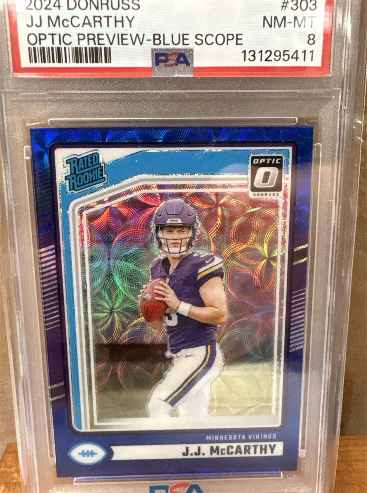 2024 Panini Donruss J.J. McCarthy #303 Optic Rated Rookie Blue Scope PSA 8